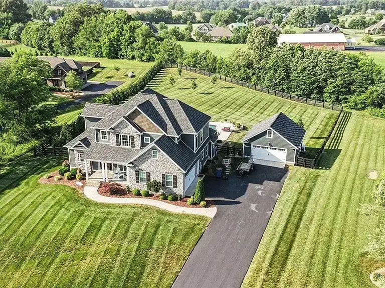 Aerial Roofing Stone Home Contracting project in Oklahoma City, OK