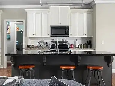 Kitchen Remodel Dark Island White Cabinets 2 project in Oklahoma City, OK