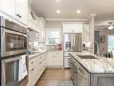 Kitchen Remodel White Cabinets Marble Countertops project in Oklahoma City, OK