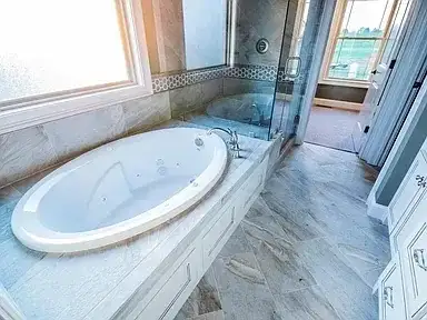 Marble Bathroom Remodel Jetted Tub project in Oklahoma City, OK