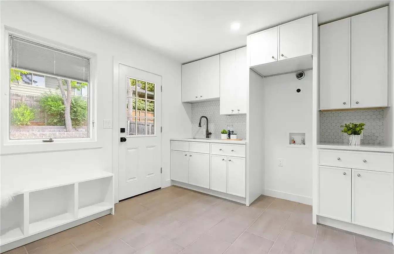 Remodeled Laundry Mudroom White Cabinets project in Oklahoma City, OK