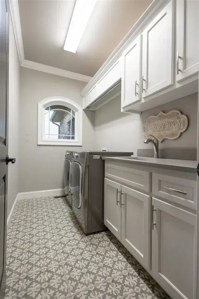 Remodeled Laundry Room White Cabinets project in Oklahoma City, OK