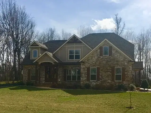 Stone Exterior Home Roofing project in Oklahoma City, OK