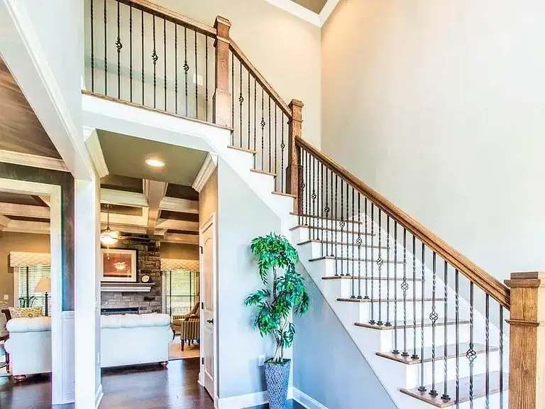 Two Story Foyer Staircase Remodeling project in Oklahoma City, OK