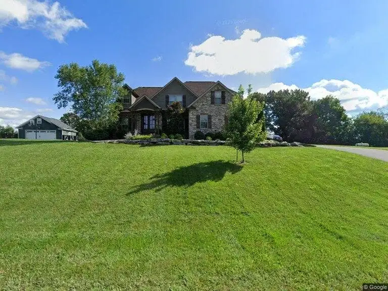 Two Story Stone Home Roofing project in Oklahoma City, OK